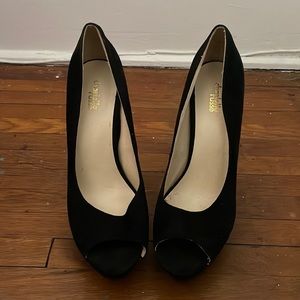 Classic black, peep toe high heel from Charlotte Russe in womens size 10.